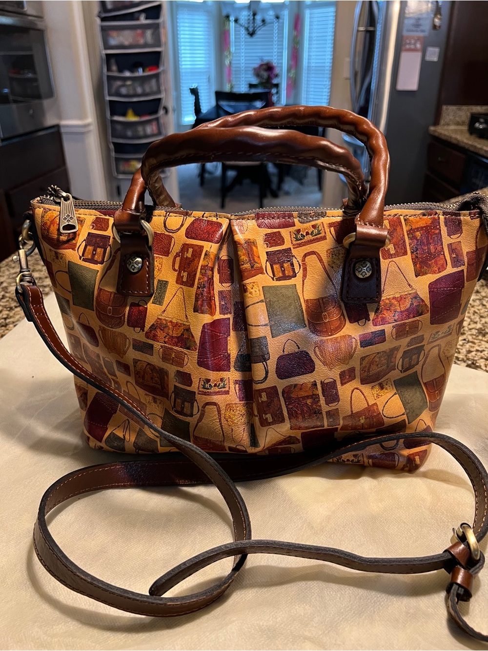 Patricia Nash Multi-Color Printed Satchel with Brown Leather Trim.
